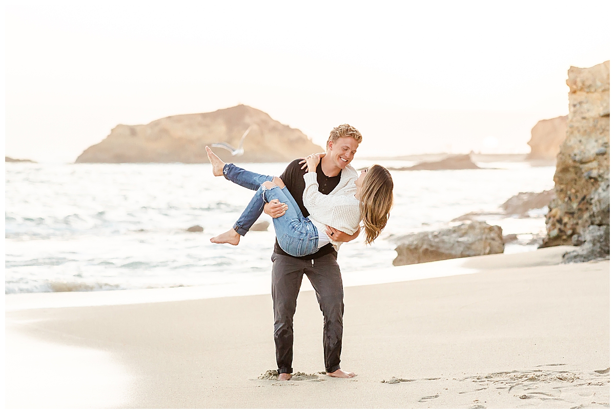Guy Carrying Girl on the Beach