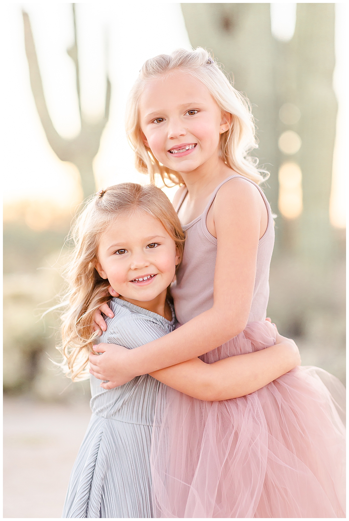 Portrait of sisters in the desert in Scottsdale, AZ photographed by Christine Deaton Creative