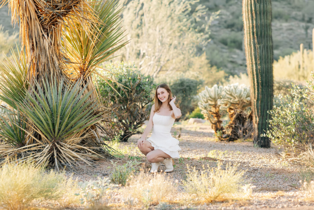 What to wear for senior pictures for girls – Scottsdale senior wearing a white dress and boots for desert senior photos